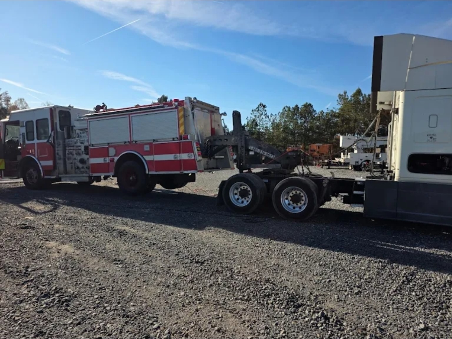 Pro-Tote tow boom moving a fire truck